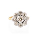 A diamond flower head cluster 18ct yellow gold ring,