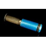 An Art Deco silver-gilt and duck egg blue guilloché enamel retractable cylinder rouge/powder brush,