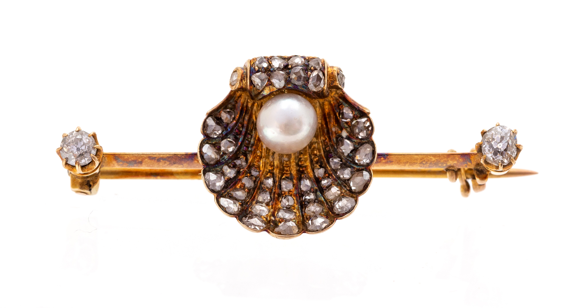 An Edwardian rose-cut diamond and pearl set bar brooch, with central scallop shell motif,
