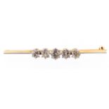 An Edwardian diamond five-stone yellow metal bar brooch,