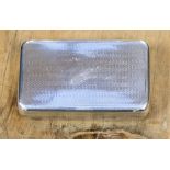 A William IV silver snuff box plain rectangular, the base with bright-cut engraved decoration,