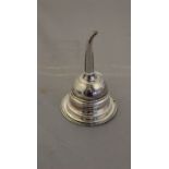 A George III silver wine funnel, circa 1800, makers marks rubbed, with a detachable pierced sifter,