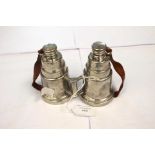 An early 20th Century novelty pewter double hip flask cast as a pair of binoculars,