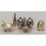 A collection of table silver including: a George V silver condiment set,