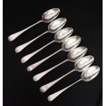 Seven George III sterling silver old English pattern dessert spoons, circa 1780,