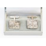 A pair of diamond 18ct white gold cufflinks, square form with applied diamond set initials W.