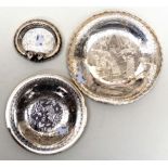 Two Middle Eastern/Egyptian white metal dishes, both engraved with Pharoahs,