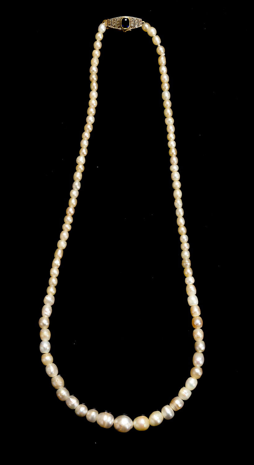 A natural pearl necklace comprising graduated pearls on a sapphire and diamond set 18ct gold clasp,