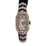 An Art Deco diamond set platinum cocktail watch, octagonal shaped head with diamond set bezel,