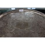 A George III large silver oval tray, with reeded border the body profusely chased with flowers,