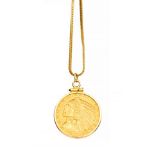 A five dollar eagle coin dated 1911, 14ct gold mount and chain, total gross weight 13.3 grams.