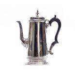 A George V silver coffee pot of Georgian design, wooden scroll handle, Elkington & Co, London 1913,