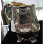 A Victorian silver mug, the hexagonal facet sections each engraved with a trailing rose and foliage,
