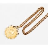 A George V 1911 sovereign, together with a 9ct holding clasp and chain,