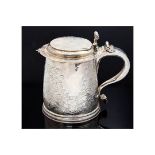 A James II silver lidded tankard, flat top domed hinged cover, scroll thumb piece, scroll handle,