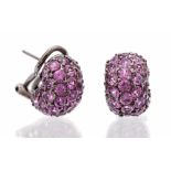 A pair of pink sapphire and 18ct white gold earrings, black rhodium plated finish,