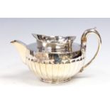 A George III silver melon shaped teapot with gadroon section flared collar, C-scroll handle,
