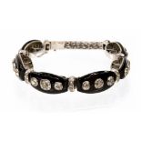 An Art Deco diamond and black onyx white gold bracelet,