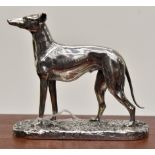 A fine Victorian silver model of a Greyhound standing on a foliate style base,