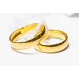 A 22ct gold wedding band, size L, 3.7 grams approx; together with a yellow metal ring I½, 3.