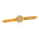 A Victorian diamond cluster yellow metal bar brooch,