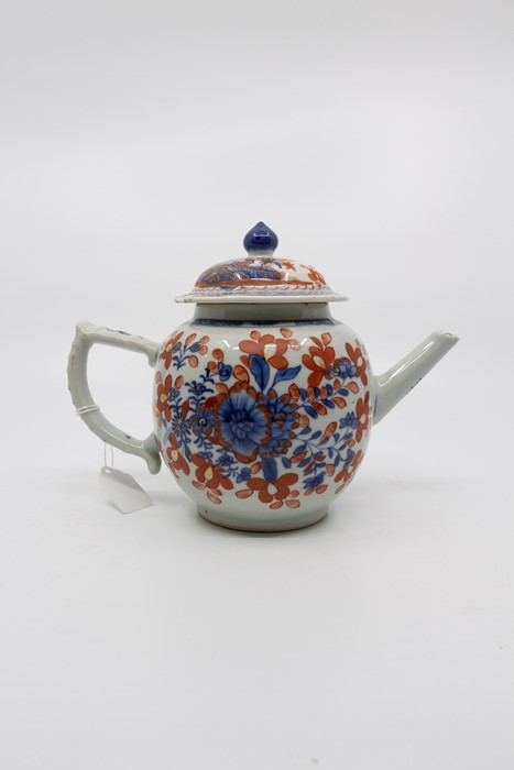 A late 18th Century Chinese teapot, the main body with floral decoration in the Imari palette, the