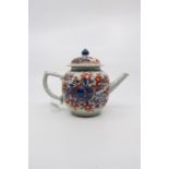 A late 18th Century Chinese teapot, the main body with floral decoration in the Imari palette, the
