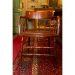 An early 20th Century captains chair, spindle back