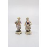 A pair of Samson figures of a boy holding a lamb and a girl with an apron full of flowers. Date c.