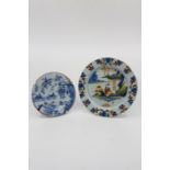 Two delftware plates; a London polychrome ‘seated Chinaman’ pattern, diameter 22 cms, and a