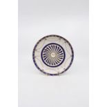 A Derby saucer dish, `crown over D' (in blue), incised N - 1778-1780/1 `Sunflower' moulding with