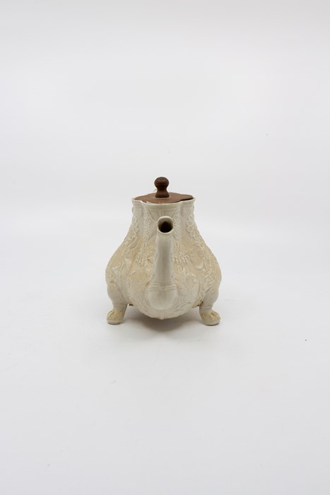 An early 18th Century Creamware tea-pot standing on 3 lions paw feet. Remnants of collectors label - Image 2 of 4