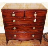 A George III mahogany chest of drawers, circa 1800, comprising two short over three long graduated