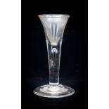 An 18th century wine glass, the trumpet bowl on tear drop stem and conical foot, 13cm high, 5.3cm