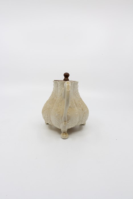 An early 18th Century Creamware tea-pot standing on 3 lions paw feet. Remnants of collectors label - Image 4 of 4