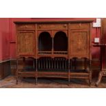 A late Victorian rosewood inlaid sideboard, c.1880, fitted with three drawers, with two doors to