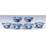 A set of six Chinese blue and white footed bowls, 19th Century, four character blue script marks,