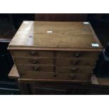 A Victorian pine Prentice chest, comprising six small drawers and one long drawer, 27cm high, 40cm
