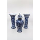 A Chinese export ware matched garniture de cheminée of five blue and white vases, early 18th