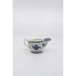 A Caughley strap fluted sauce boat fruit and wreath pattern circa 1777-1785, Length 17.5 cms,