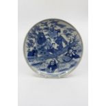 A Chinese blue and white charger, depicting the Eight Immortals, blue mark for Guangzu period (