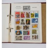 A collection of 4 stamp albums and contents.
