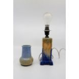 A Ruskin blue ground table lamp; together with a similar Ruskin bottle neck vase (2) Size; Lamp -