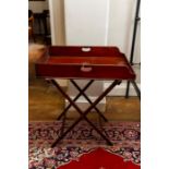 George III mahogany butlers tray on folding stand