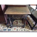 A George I joined oak side table, circa 1720, with a fitted single drawer, raised on turned supports