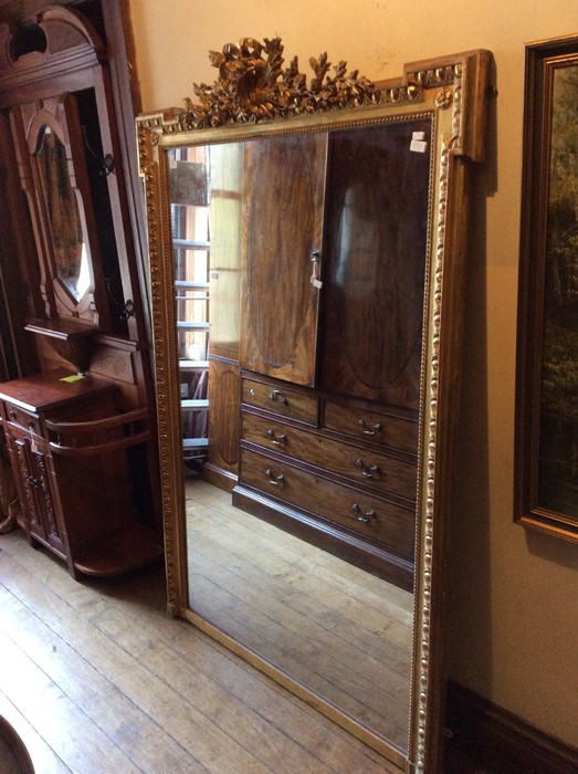 ****WITHDRAWN****A 19th century gilt wood over mantle mirror with egg and dart moulded frame.