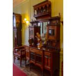 A late Victorian rosewood and marquetry inlaid chiffonier, mirror backed, the upper section with a