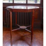 An Edwardian mahogany octagonal occasional table, of two-tier form, raised on square tapered legs