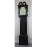 A 19th Century provincial oak longcase clock, the white dial with Roman numerals, chip carved