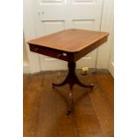 A Regency mahogany occasional table, crossbanded and inlaid with stringing, the rectangular top